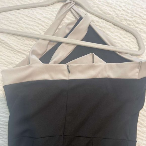 Black and white jumpsuit.  Classy, elegant neckline.  Size small - Picture 5 of 7